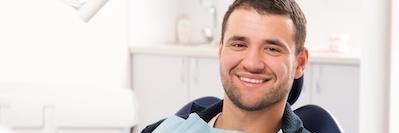 Man smiling after dental cleaning in Aurora, IL
