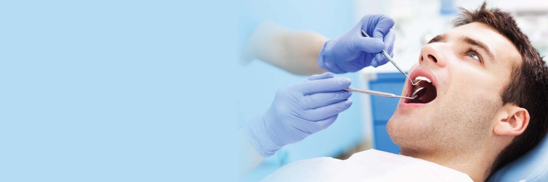 Patient undergoing dental cleaning in Aurora, IL