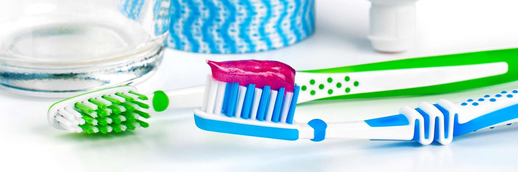 Blue and green tooth brushes in Aurora, IL