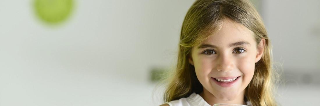 Small girl smiling after general dentistry in Aurora, IL