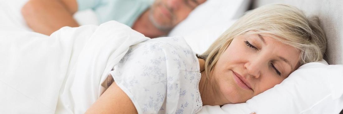 Woman sleeping soundly after Sleep Apnea treatment in Aurora, IL